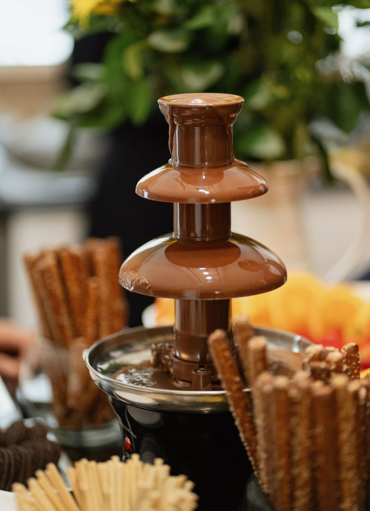 Fondue fountain at a dinner styled by Keely + Co.